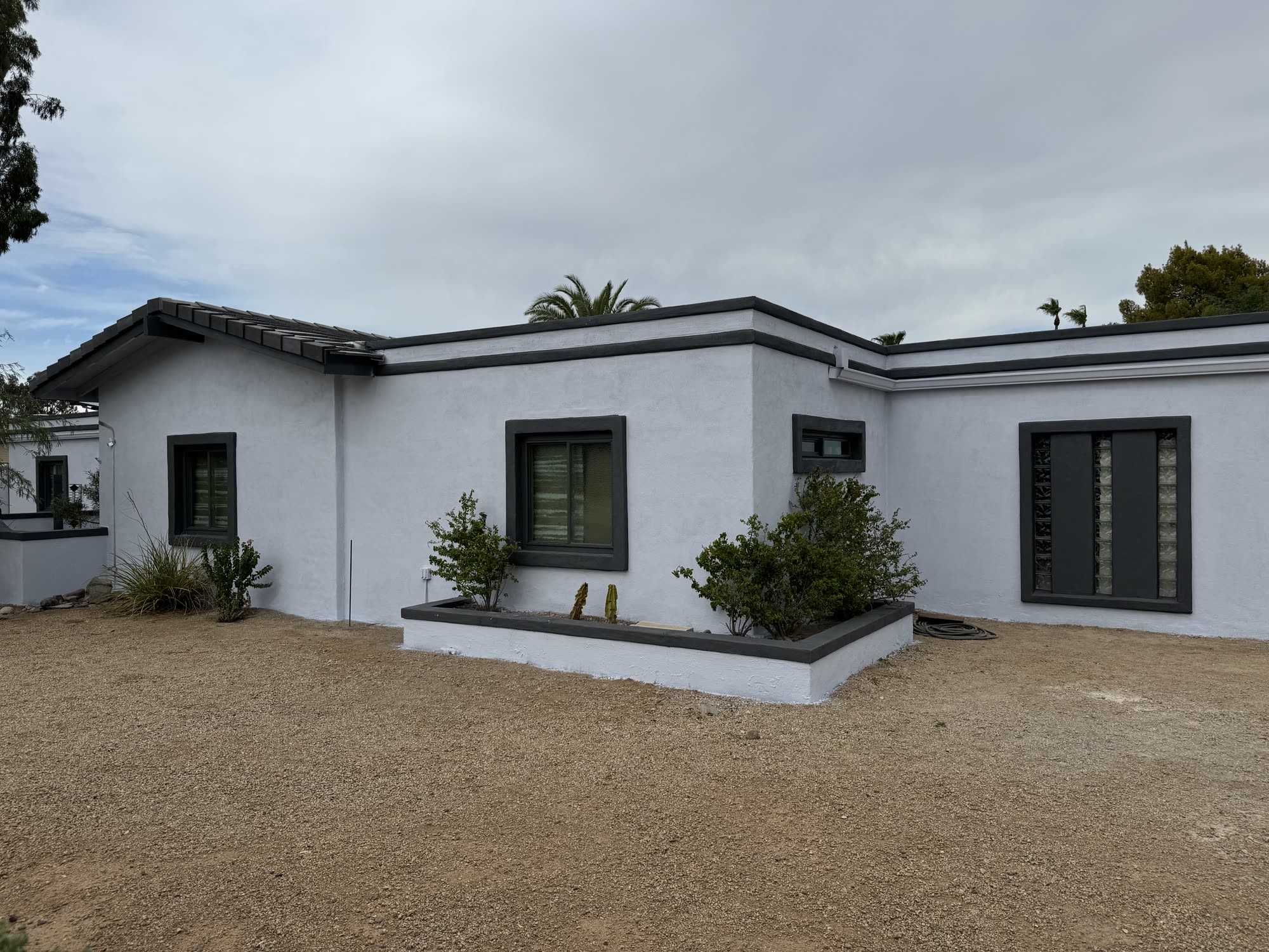 Stucco repair seamlessly blended into existing wall
